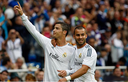 Jesé Rodríguez hugging Cristiano Ronaldo after a goal