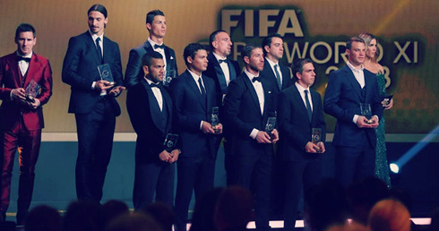 Lionel Messi standing out at the FIFA Ballon d'Or 2013 gala, wearing a weird red fashion smoking