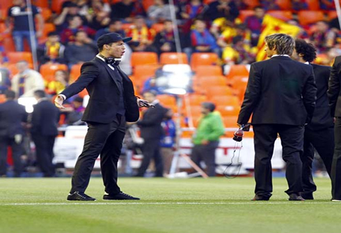 Cristiano Ronaldo goal celebration while wearing a suit