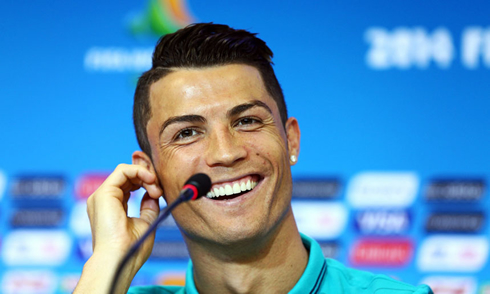 Cristiano Ronaldo smiling in a World Cup 2014 press conference