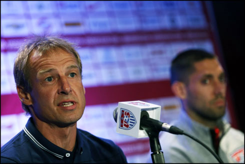 Jurgen Klinsmann, the USA National Soccer Team coach, next to Clint Dempsey