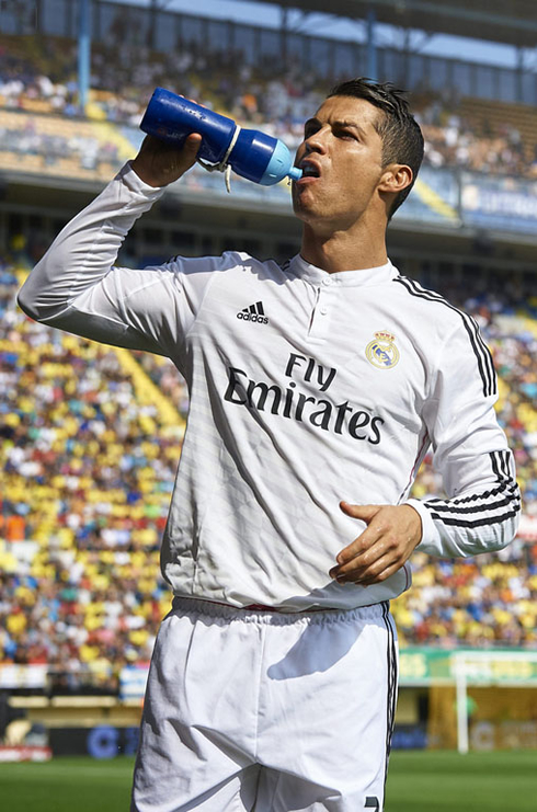 Cristiano Ronaldo drinking straight from a bottle