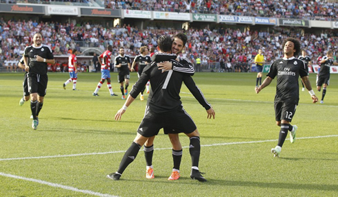 Cristiano Ronaldo waiting for his teammates, as he celebrates a goal for Real Madrid