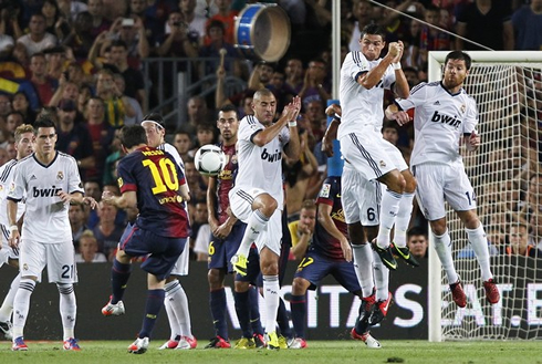 Cristiano Ronaldo jumping more than anyone else in a freekick wall, against a Lionel Messi set piece, in Barcelona vs Real Madrid in 2012