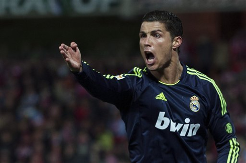 Cristiano Ronaldo looking nervous and irritated with someone, during a Real Madrid game in 2013