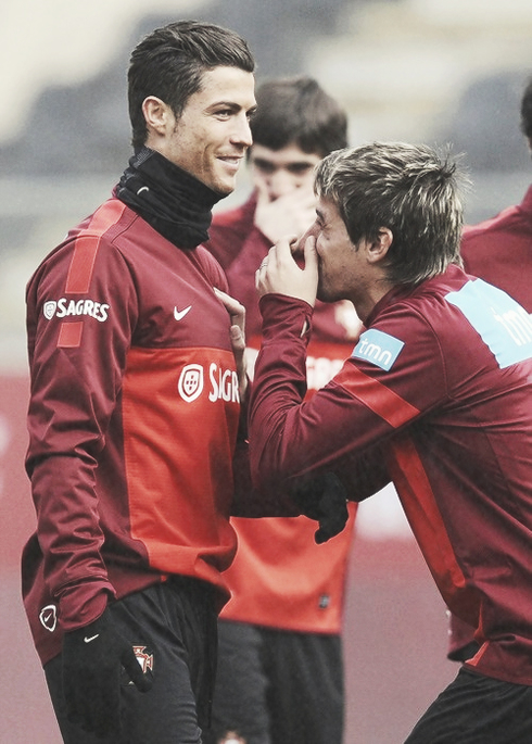 Cristiano Ronaldo laughing with Fábio Coentrão, in Portugal 2013