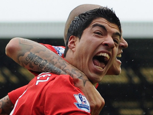 Luis Suárez opening his mouth and showing his big teeth