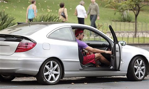 Cristiano Ronaldo preparing to drive his Mercedes Benz C Class Sports Coupé